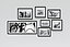Black and white pictures on a wall of a bicycle